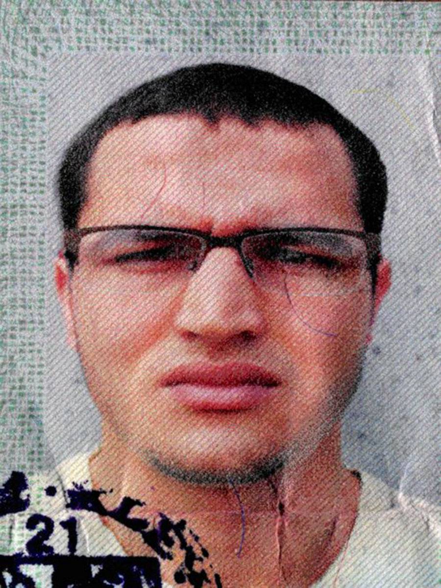 Handout picture released by the German Bundeskriminalamt (BKA) Federal Crime Office shows suspect Anis Amri searched in relation with the Monday's truck attack on a Christmas market in Berlin