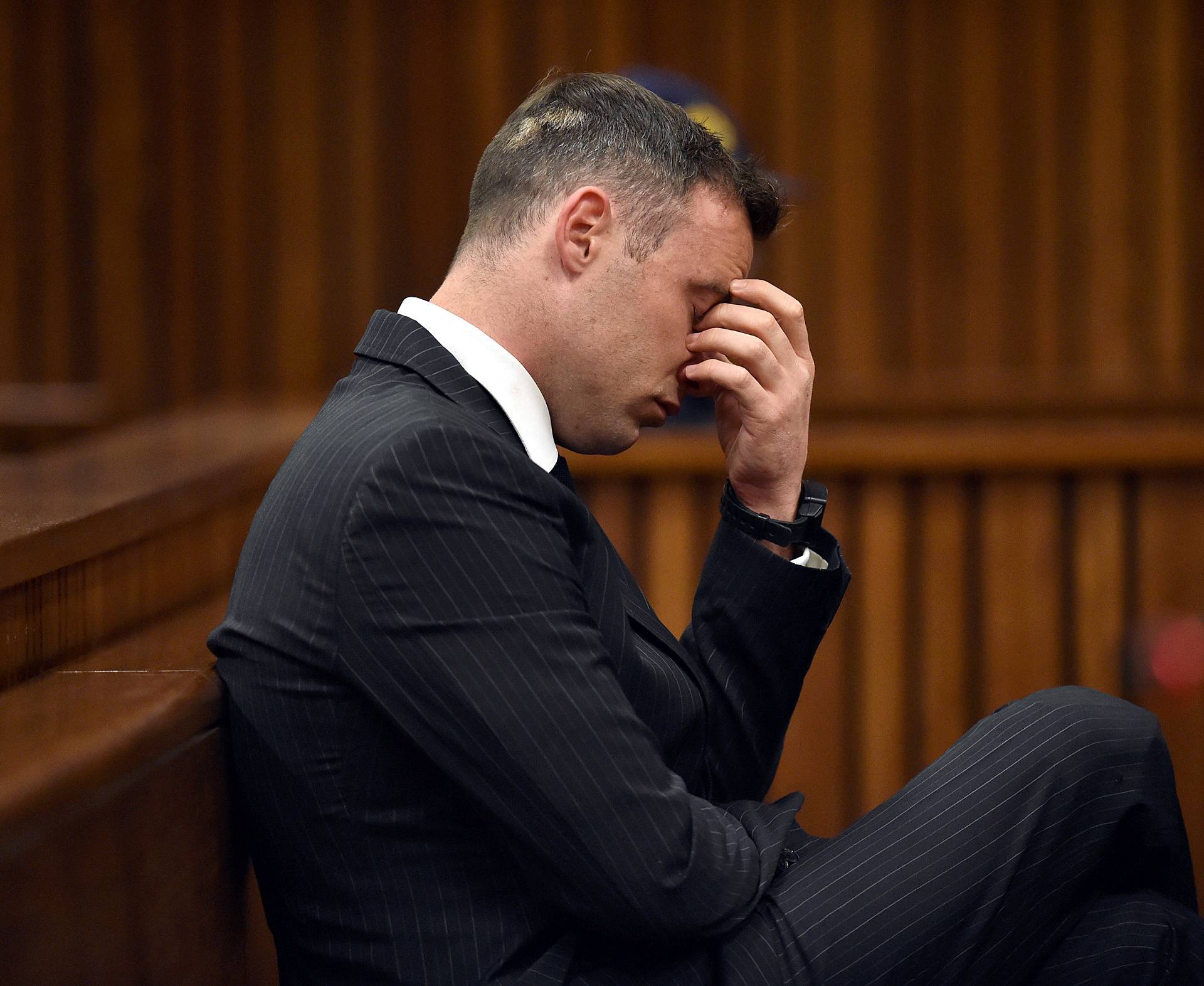 Former Paralympian Oscar Pistorius attends his sentencing for the murder of Reeva Steenkamp at the Pretoria High Court