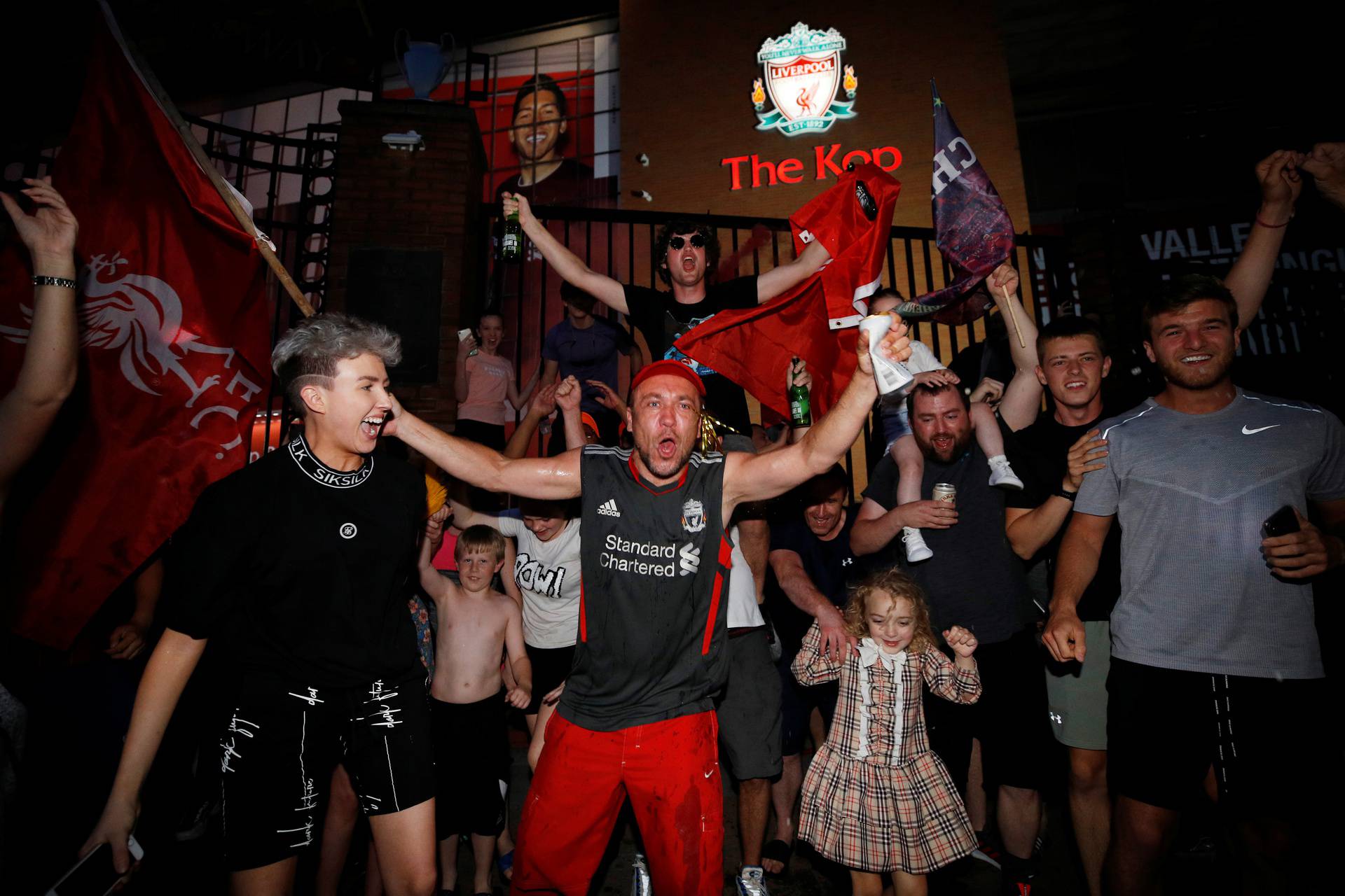 Premier League - Liverpool fans celebrate winning the Premier League