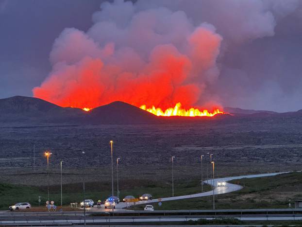 A volcano erupts, near Vogar