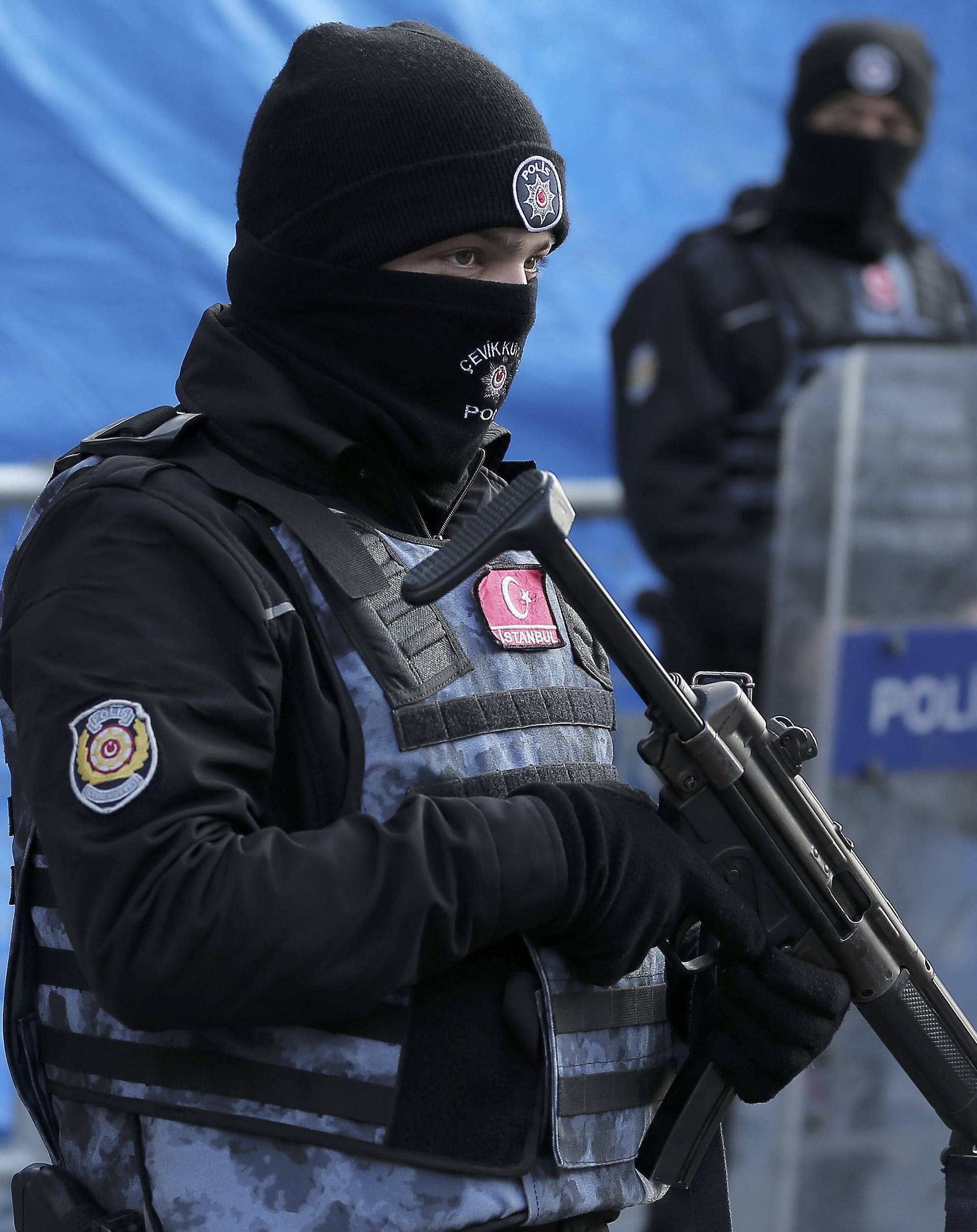 Turkish police stand guard outisde the Reina nightclub by the Bosphorus, which was attacked by a gunman, in Istanbul