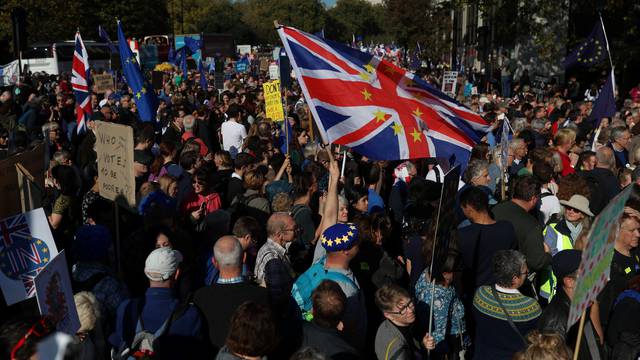 Protesters participating in an anti-Brexit demonstration, march through central London