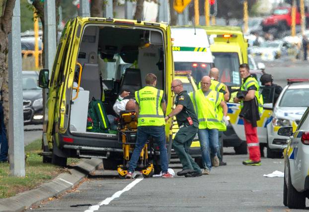 An injured person is loaded into an ambulance following a shooting at the Al Noor mosque in Christchurch