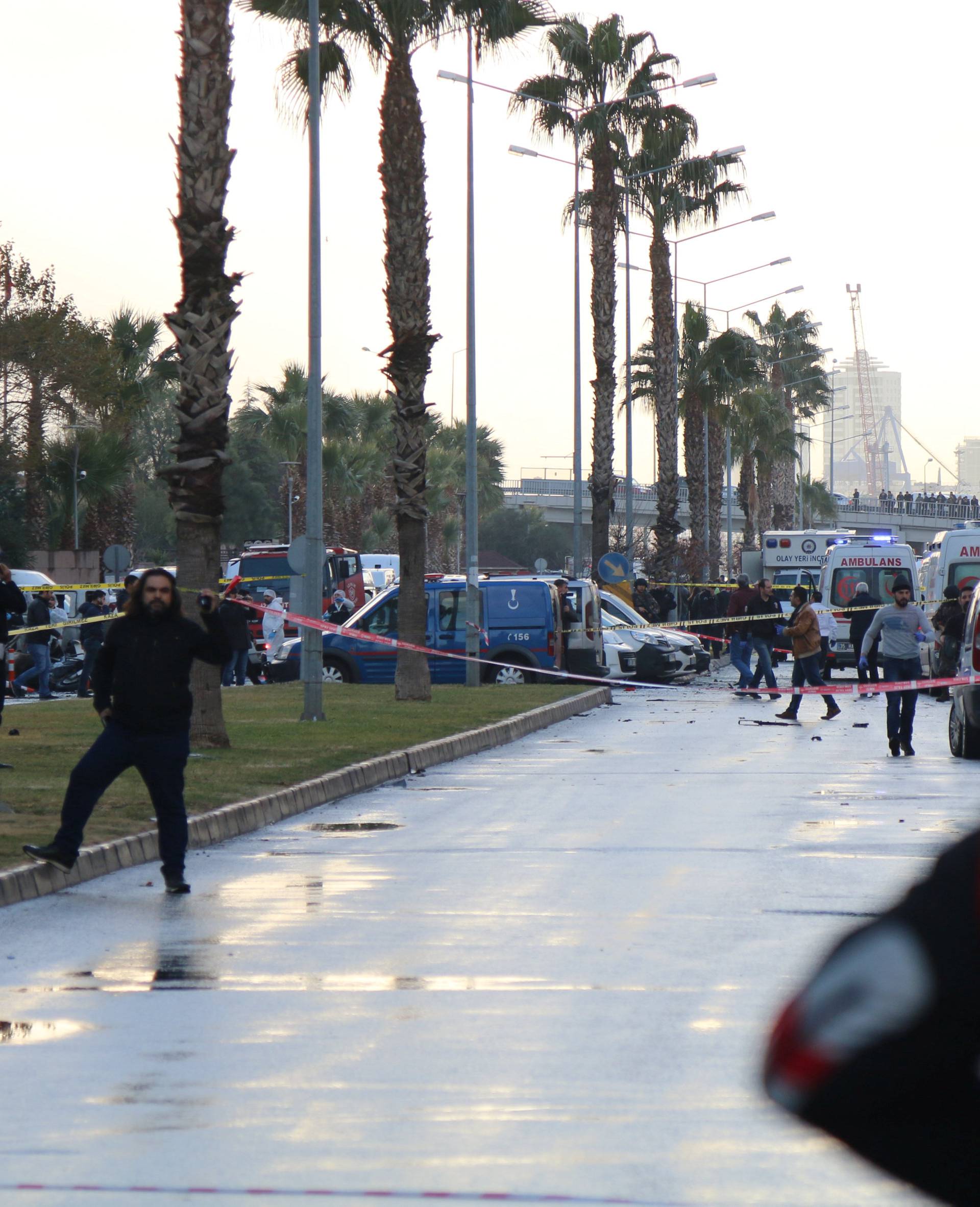 Police secure the area after an explosion outside a courthouse in Izmir