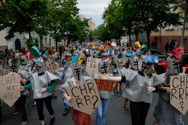 People attend a protest rally in support of public media as the Czech government plans to revamp and cut funding for Czech TV and Czech Radio, in Prague