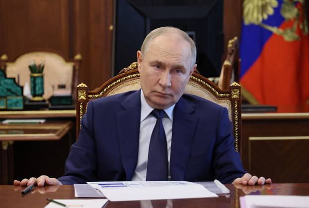 Russian President Vladimir Putin chairs a meeting on social issues, in Moscow