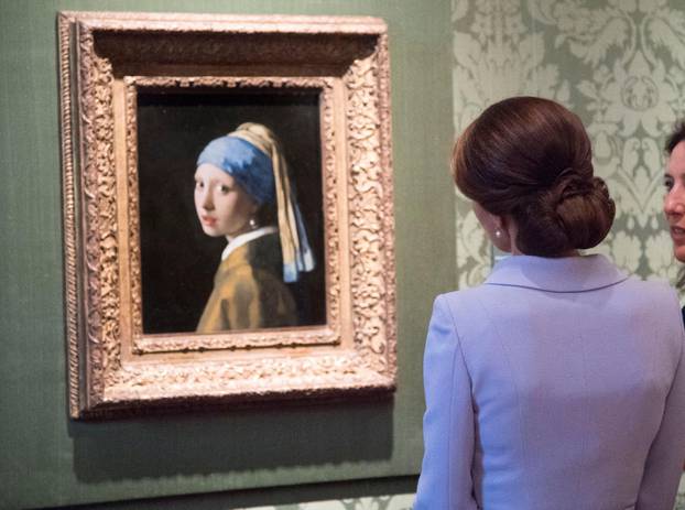 FILE PHOTO: Britain's Kate, the Duchess of Cambridge views Girl with a Pearl Earring by Johannes Vermeer during a visit to the Mauritshuis in The Hague