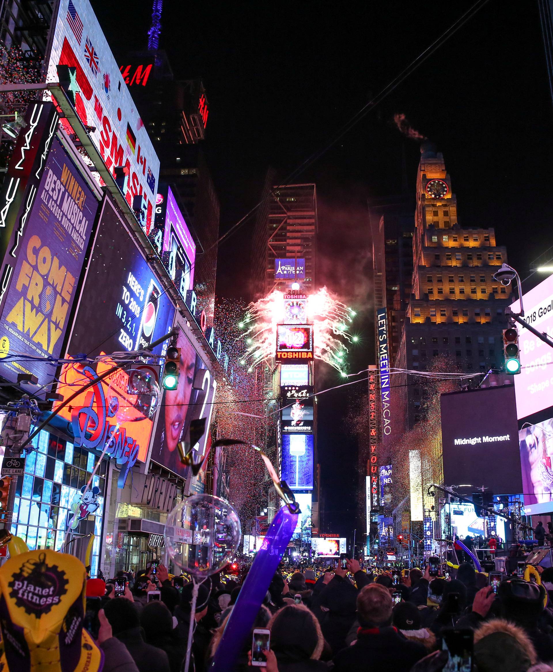 FILE PHOTO: Revelers celebrate the New Year's Eve in Times Square in New York