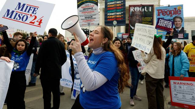 FILE PHOTO: Demonstrators rally outside the U.S. Supreme Court in Washington