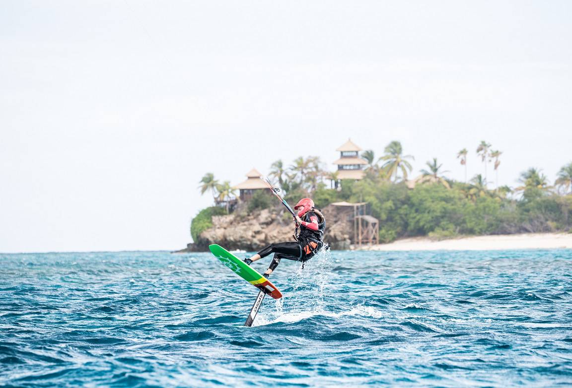 British businessman Richard Branson kite surfs during an outing with former U.S. President Barack Obama during his holiday on Branson's Moskito island, in the British Virgin Islands, in a picture handed out by Virgin