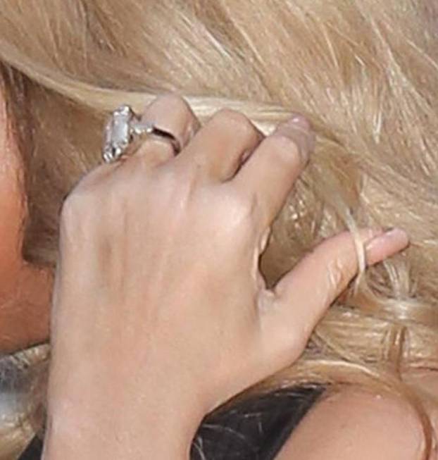 MARIAH CAREY Leaves hotel in Paris