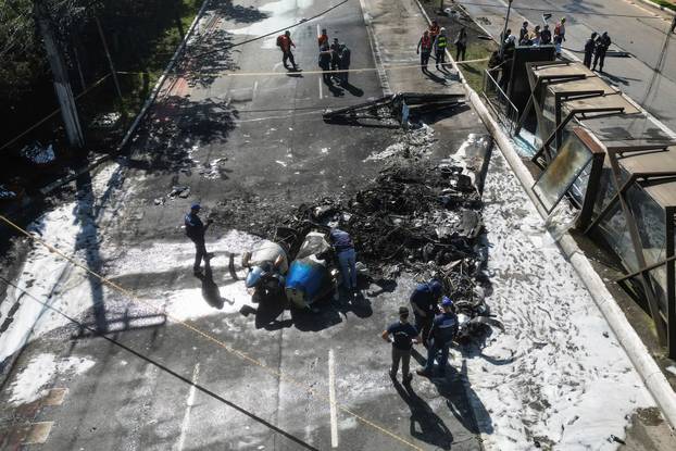 Small plane crashes into vehicles on busy Sao Paulo avenue