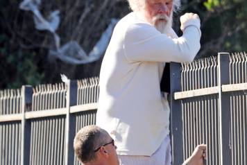 *EXCLUSIVE* Nick Nolte climbs a fence in his PJ's in Malibu