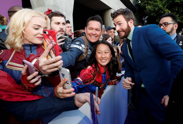 Cast member Chris Evans poses with fans on the red carpet at the world premiere of the film "The Avengers: Endgame" in Los Angeles