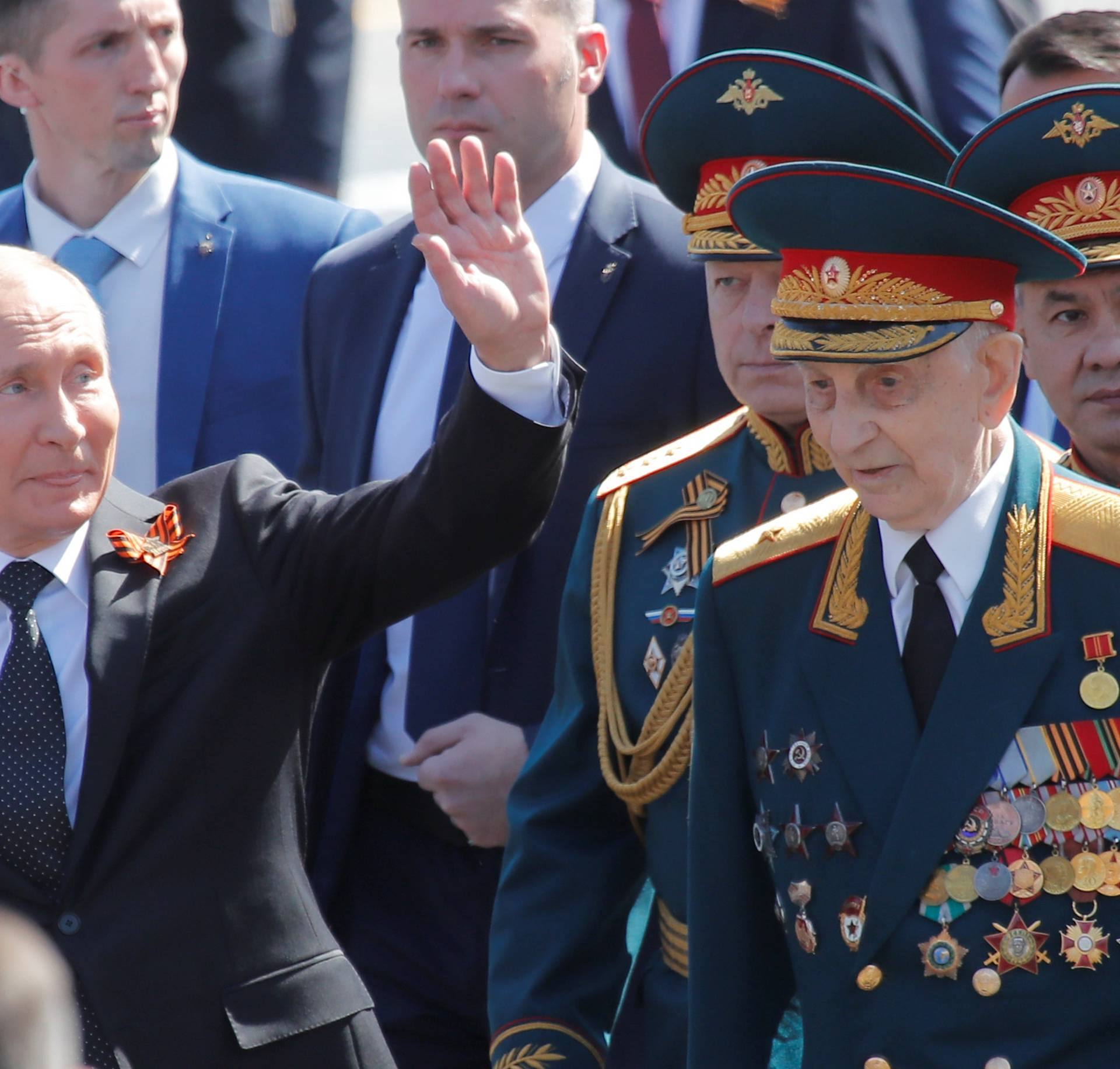 Russian President Vladimir Putin and  Defence Minister Sergei Shoigu attend the Victory Day parade at Red Square in Moscow