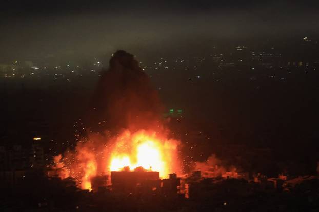 An Israeli strike on Beirut's southern suburbs, following an escalation between Hezbollah and Israel amid the U.S.-Israeli conflict with Iran