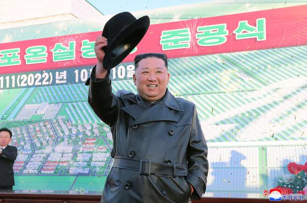 North Korea's leader Kim Jong Un attends the opening ceremony of the Ryonpho Greenhouse Farm