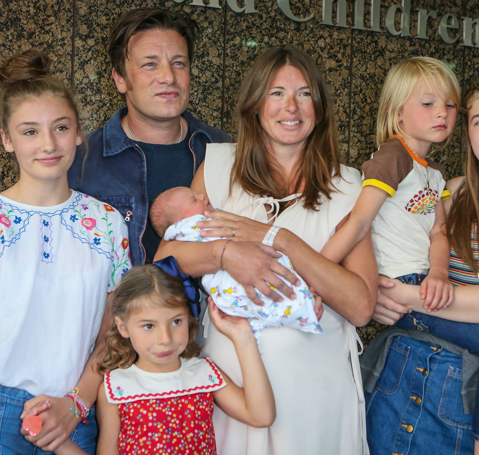 Jamie Oliver and his wife Jules leaving the Portland Hospital with their 5th baby boy who was born yesterday - London