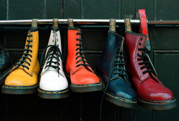 Shoe shops exterior Dr Martens boot display off Brick Lane in Londons East End