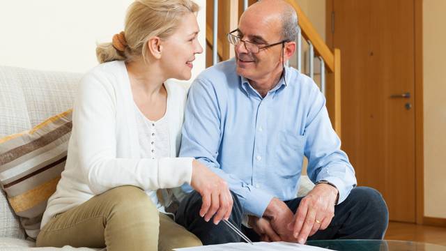 Mature couple with financial documents