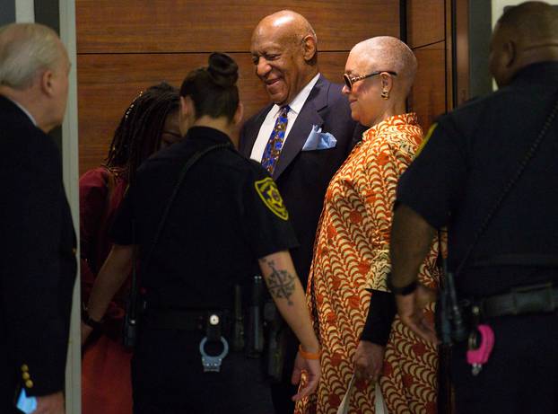 Bill Cosby and Camille Cosby ride the elevator at the Montgomery County Courthouse in Norristown