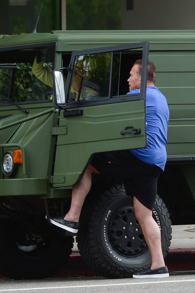 EXCLUSIVE: Arnold Schwarzenegger and Heather Milligan Run Errands in his New Military Truck.