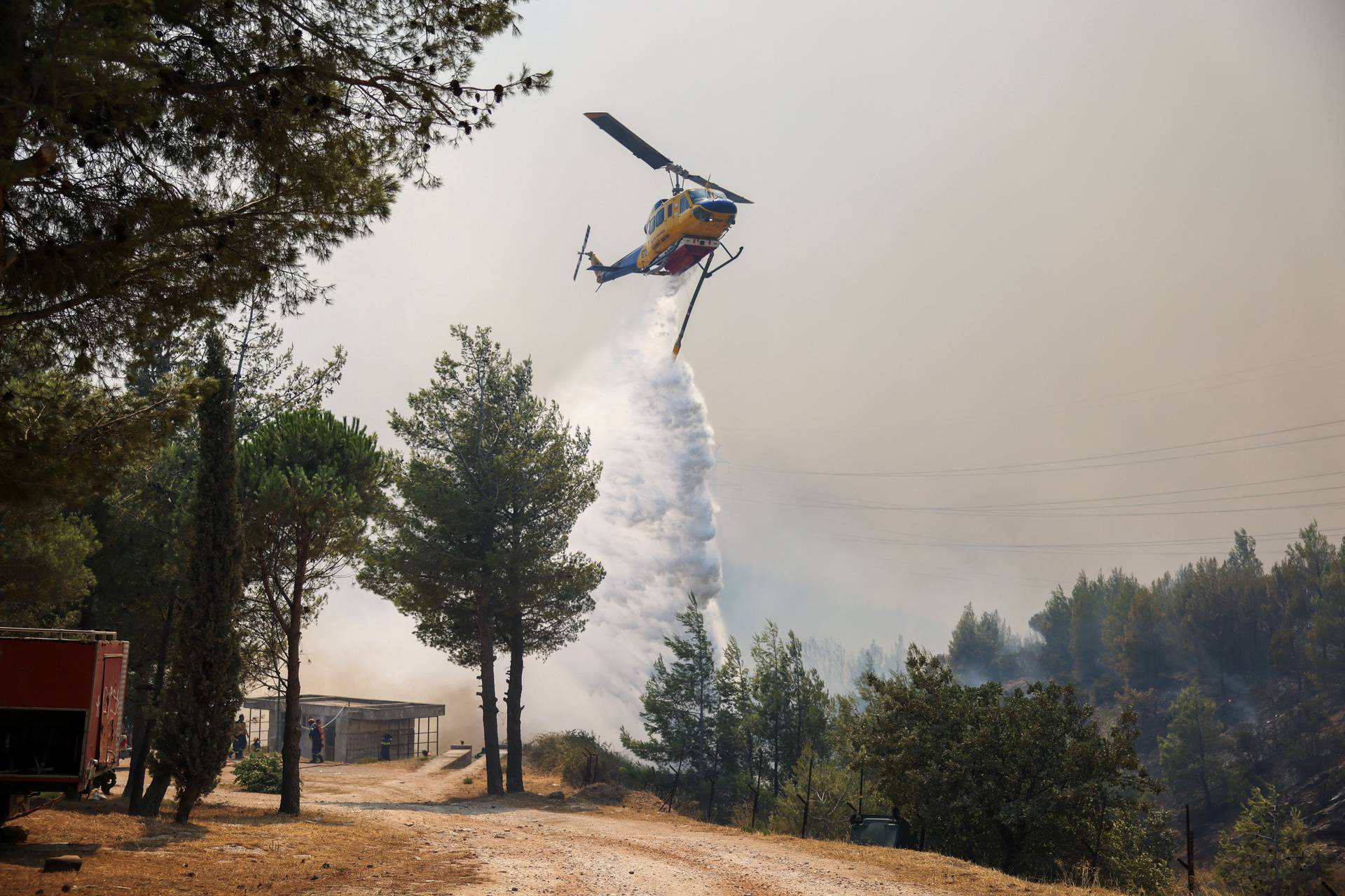 Wildfire burns in Penteli, near Athens