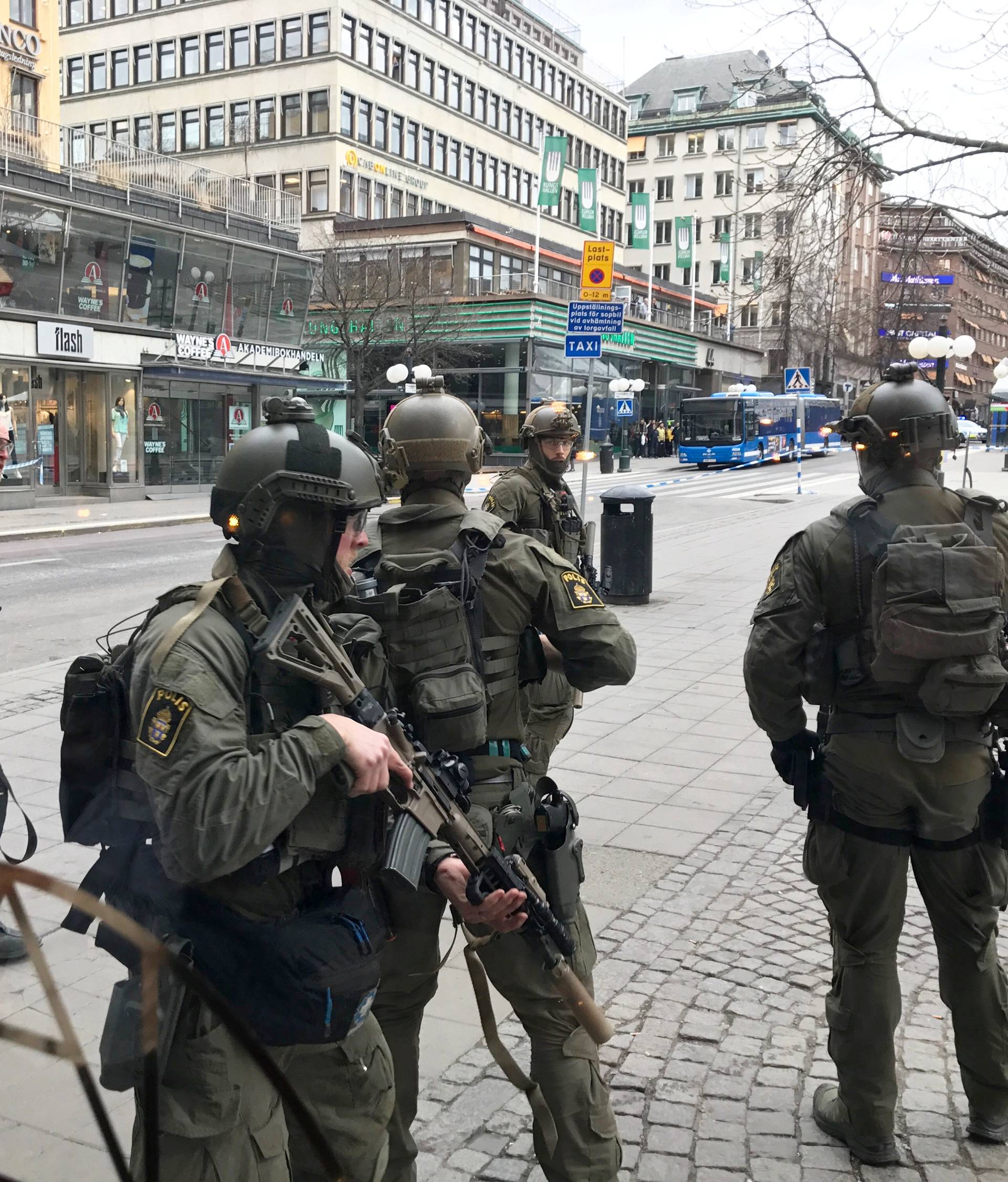 Sweden's police officers guard in the central Stockholm