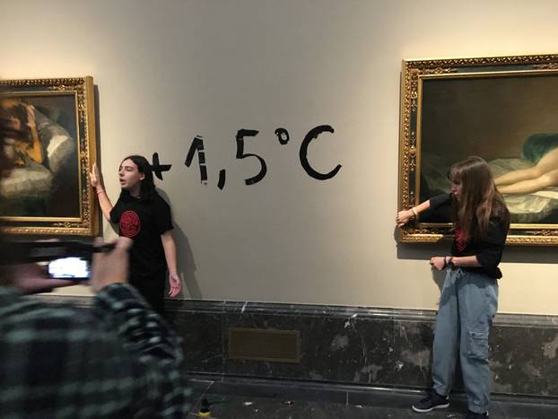 Climate protesters from Extinction Rebellion stick themselves to Goya's "Las Majas" paintings to alert about the climate emergency in Madrid
