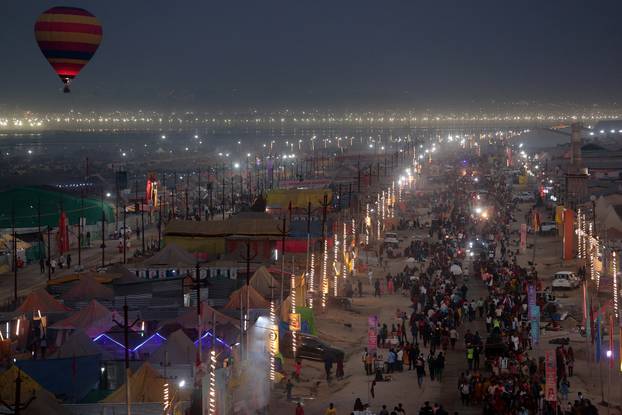 An evening view of Arail Ghat on the banks of Yamuna river during the "Maha Kumbh Mela" in Prayagraj
