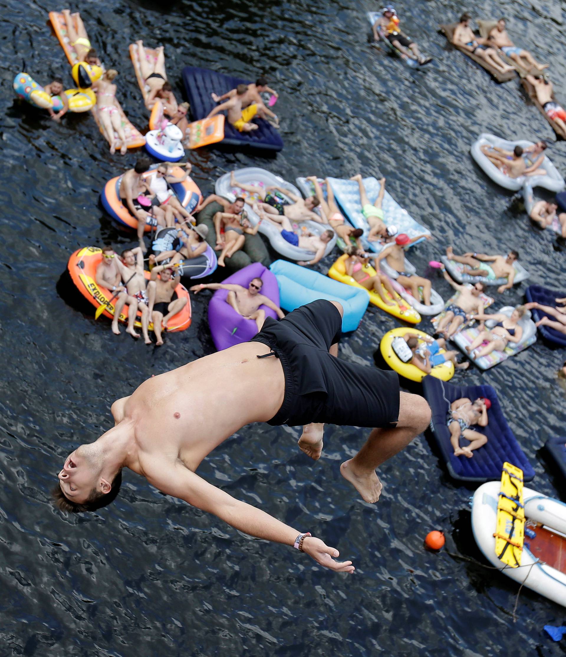 A man jumps into the water before a cliff diving competition near the central Bohemian village of Hrimezdice