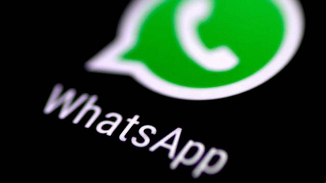 FILE PHOTO: FILE PHOTO: The WhatsApp messaging application is seen on a phone screen