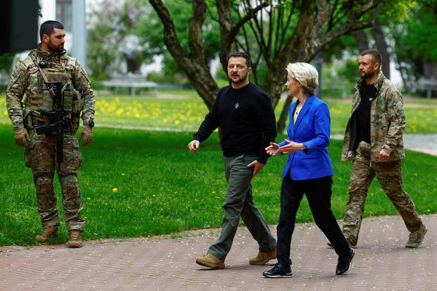 European Commission President von der Leyen and Ukraine's President Zelenskiy walk after a joint press conference in Kyiv