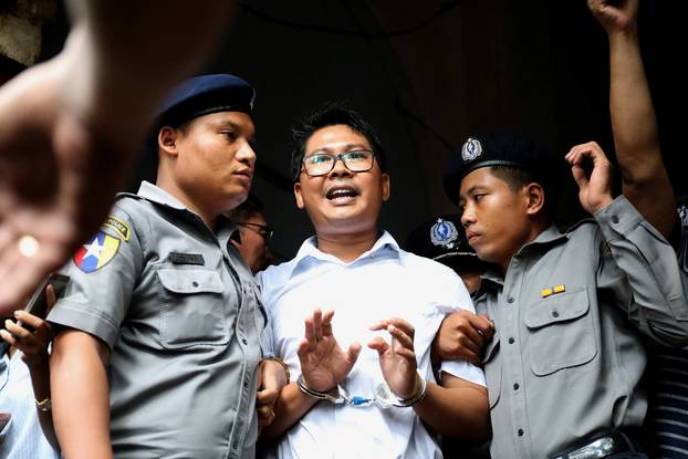 Reuters journalist Wa Lone departs Insein court after his verdict announcement in Yangon