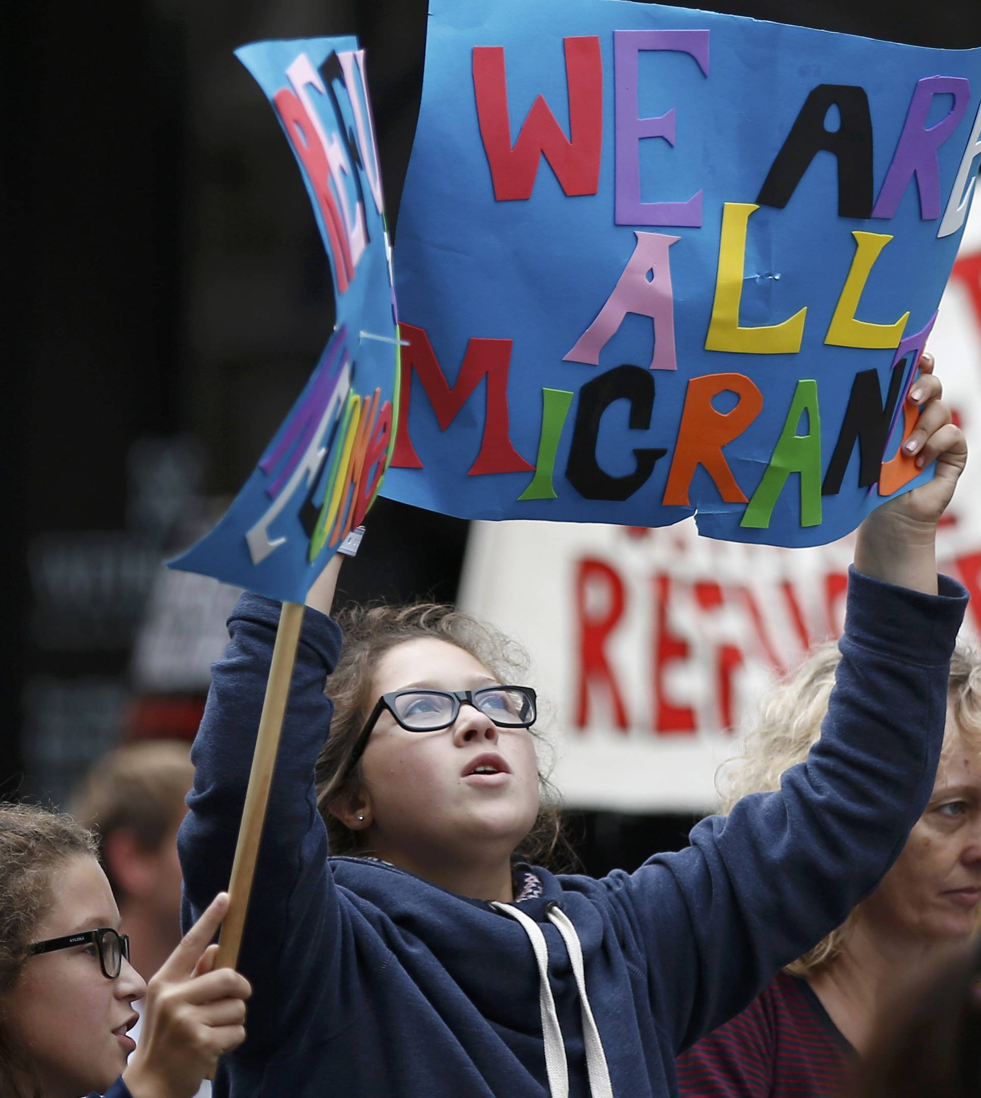 Demonstrators including refugees march to the Houses of Parliament during a protest in support of refugees, in London