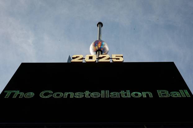 A newly created New Year's eve ball is raised for the first time above One Times Square ahead of the New Year's Eve ball drop in New York