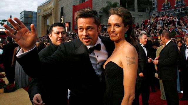 Actors Brad Pitt and Angelina Jolie arrive at the 81st Academy Awards in Hollywood, California