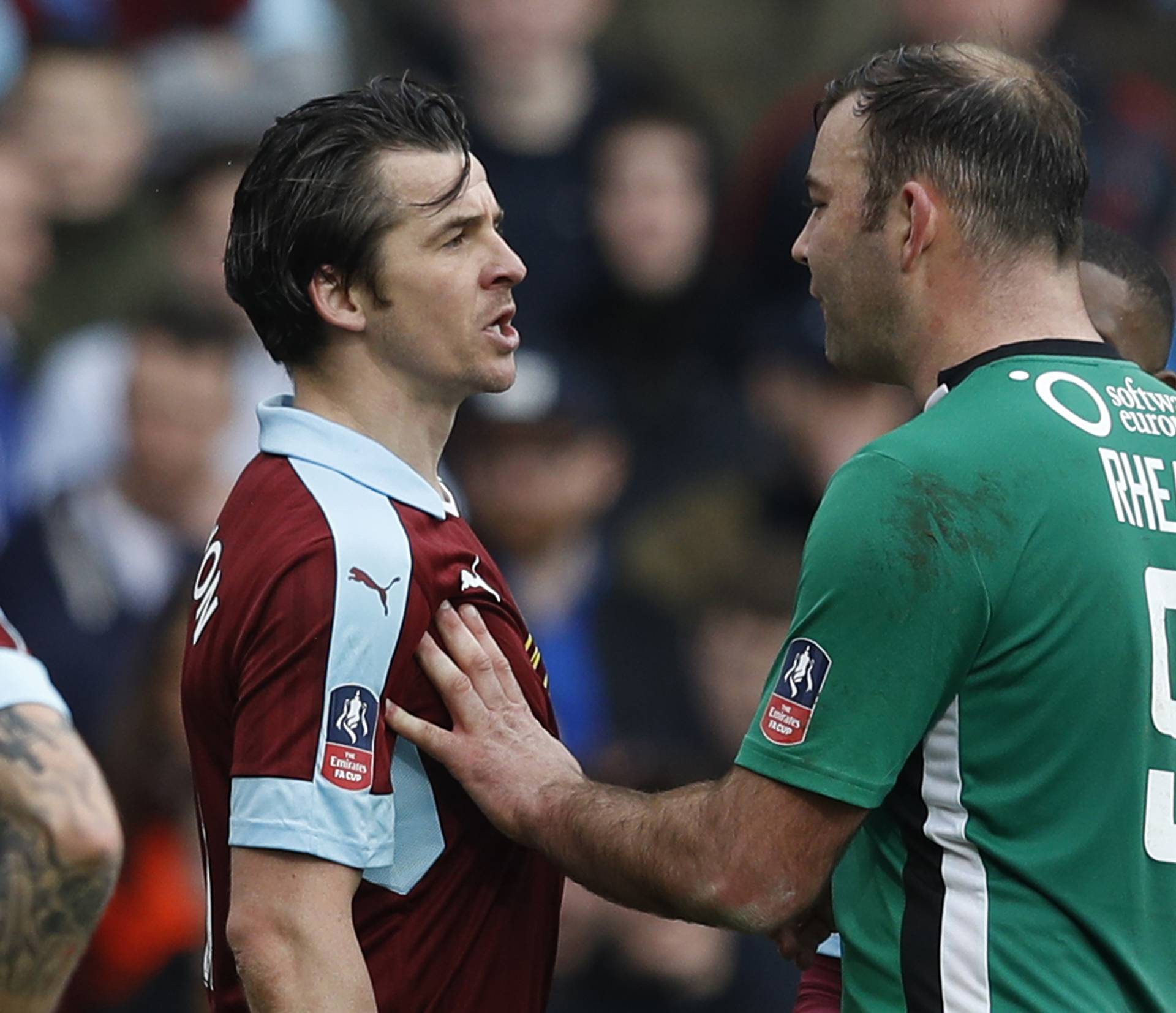 Burnley's Joey Barton clashes with Lincoln's Matthew Rhead