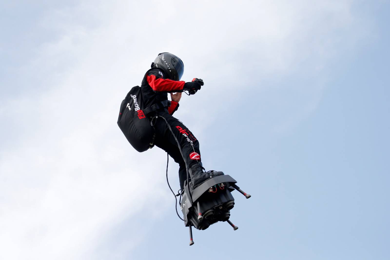 French inventor Franky Zapata lands on a Flyboard during a demonstration as he prepares to cross the English channel from Sangatte in France to Dover, at the Saint-Inglevert aerodrome