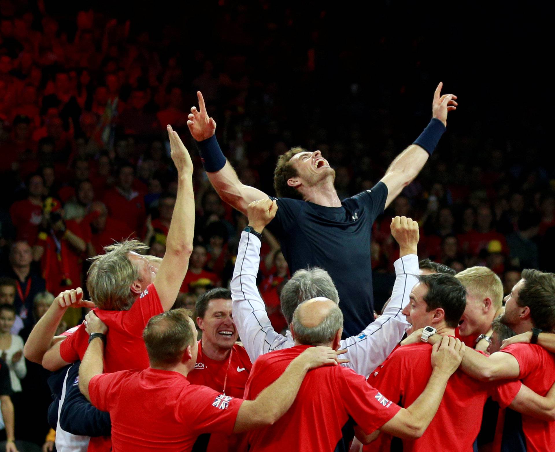 FILE PHOTO: Britain's Andy Murray celebrates with team mates after beating Belgium's David Goffin to win the Davis Cup at Flanders Expo, Ghent, Belgium - 29/11/15