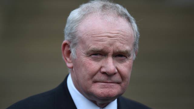 FILE PHOTO: Northern Ireland's Deputy First Minister Martin McGuinness pauses before speaking to media at Stormont Castle as he arrives to greet Colombia's President Juan Manuel Santos who is on a state visit to Belfast, Northern Ireland