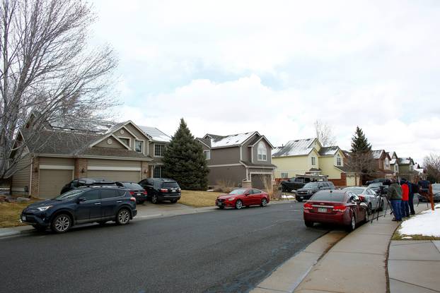 Members of the news media face the family home of the King Soopers shooting suspect Ahmad al Aliwi Alissa, in Arvada