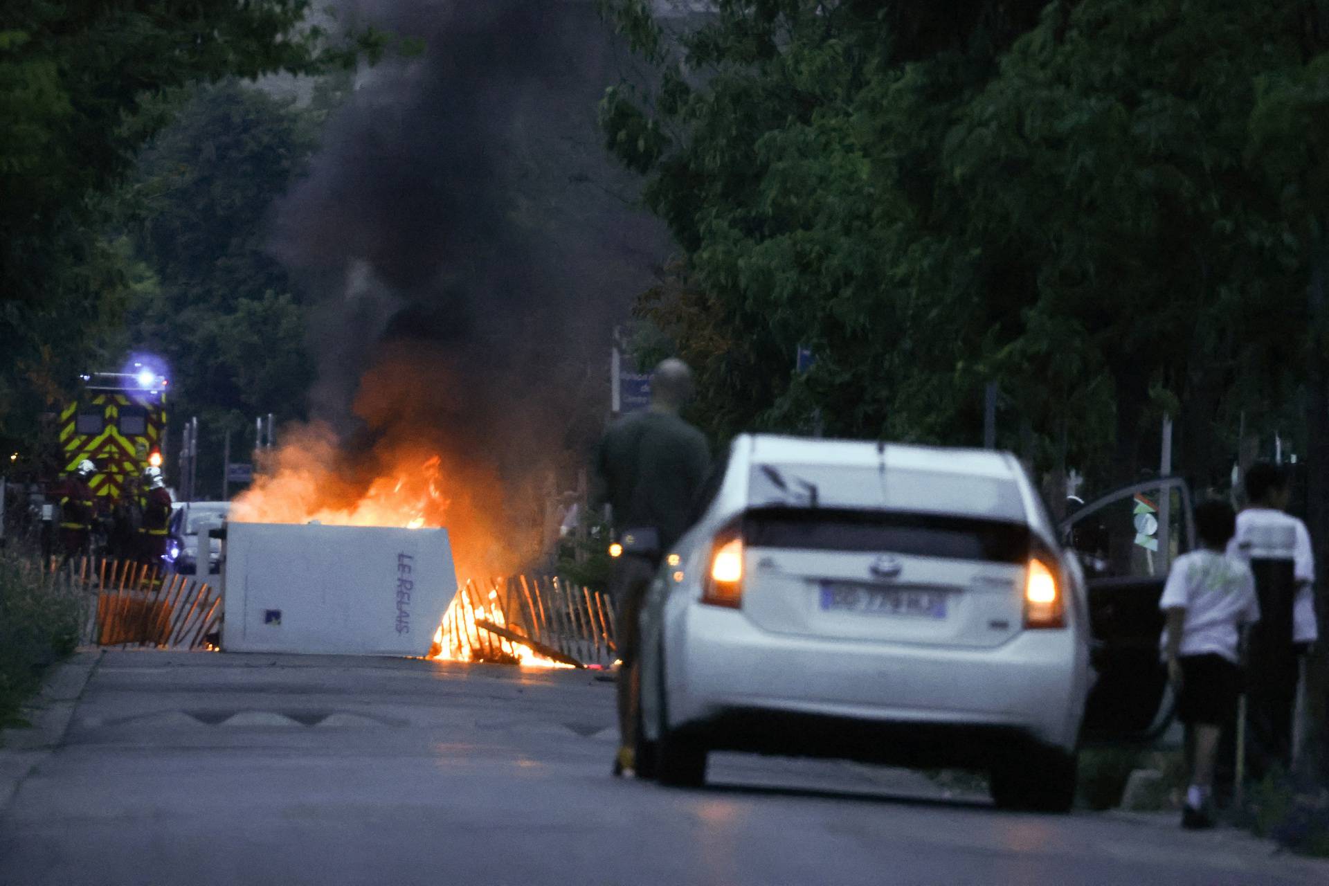 Riots after a teenager shot dead by police in Paris suburb