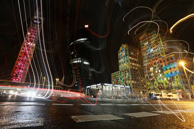 Buildings are illuminated at Potsdamer Platz during the Festival of Lights in Berlin