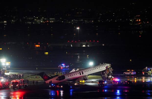 Air Canada Express jet collides with a ground vehicle at LaGuardia airport