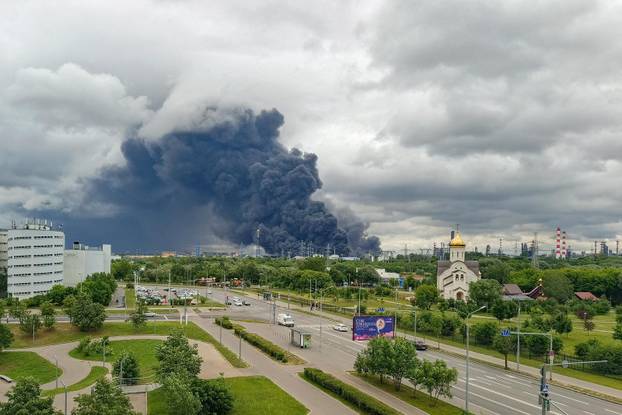 Smoke rises from an oil refinery following a Ukrainian drone attack in Moscow
