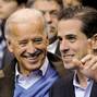 FILE PHOTO: U.S. Vice President Biden and his son Hunter attend an NCAA basketball game between Georgetown University and Duke University in Washington