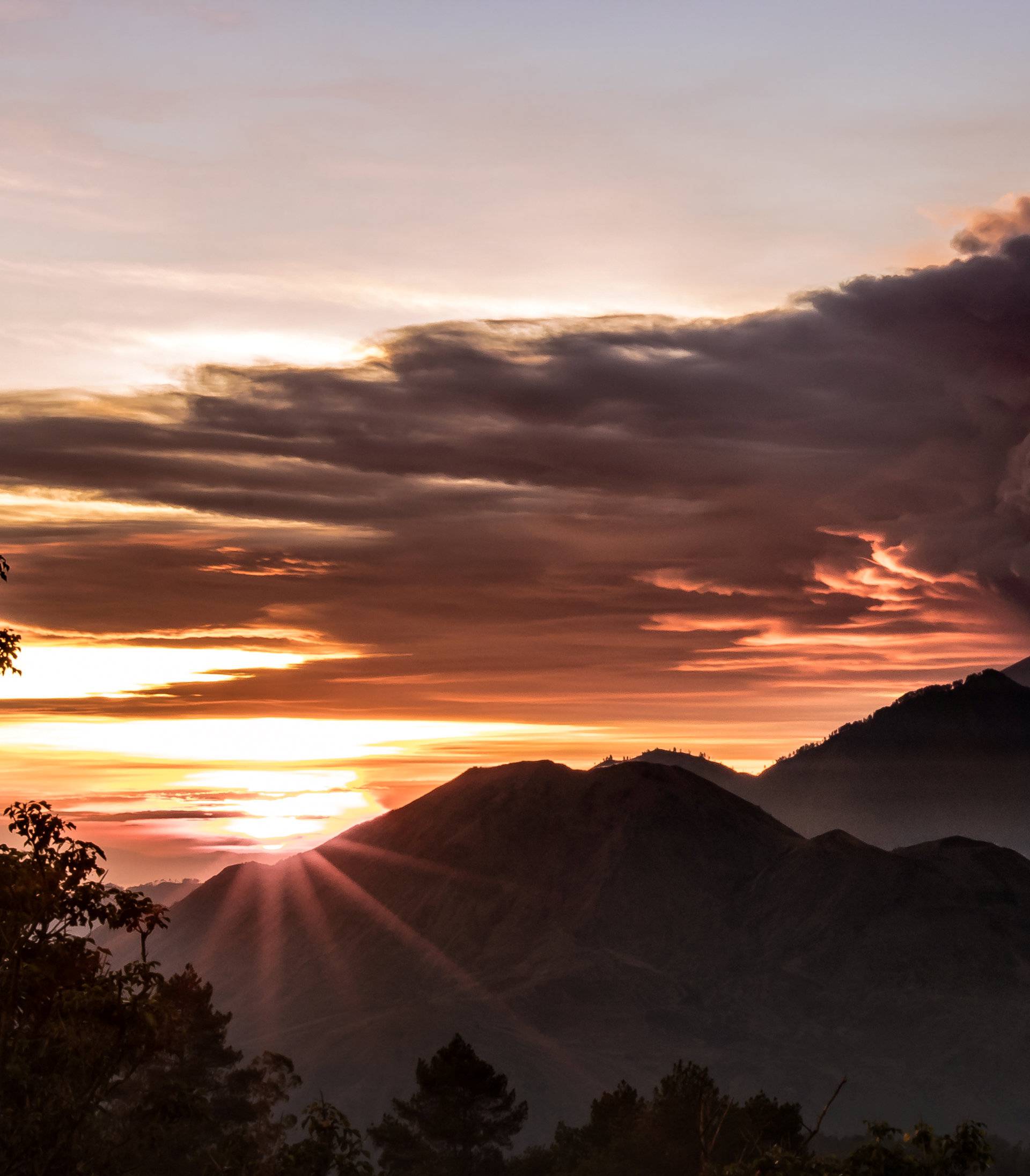 Mount Agung volcano is seen spewing smoke and ash in Bali, Indonesia