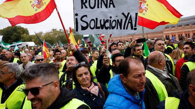 Spanish truckers and farmers march to protest over working conditions and fair prices in Madrid