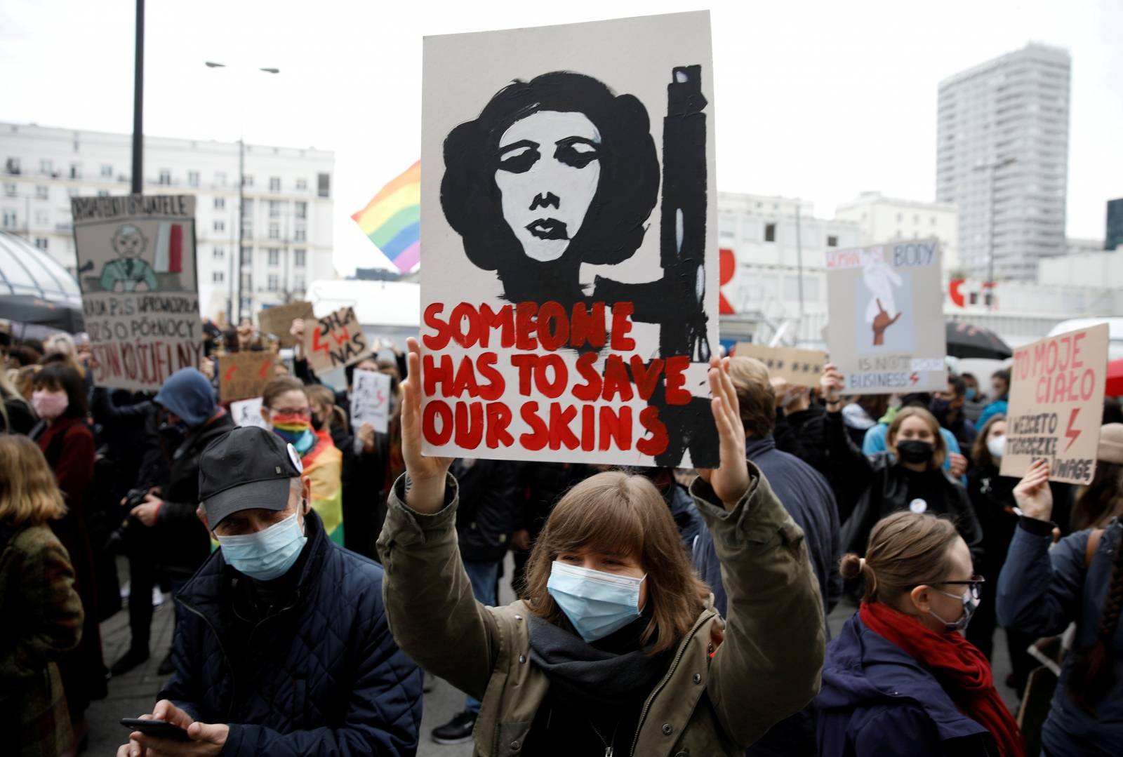 FILE PHOTO: People take part in a protest against the ruling by Poland's Constitutional Tribunal that imposes a near-total ban on abortion in Warsaw
